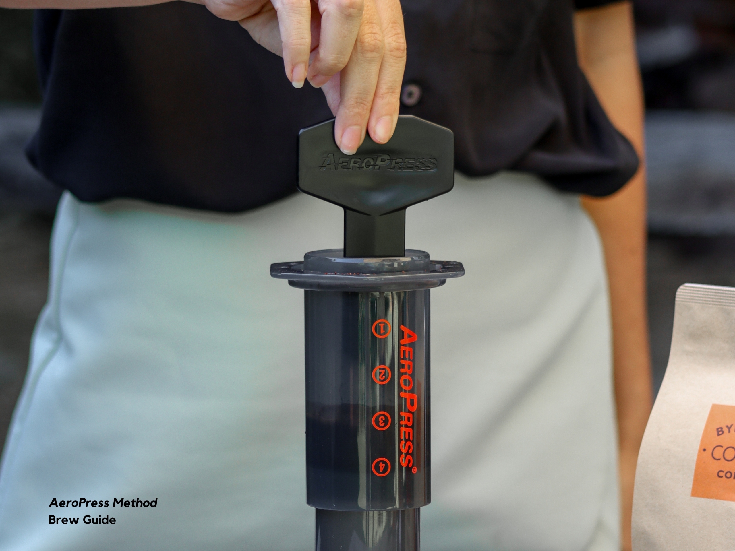 Stirring coffee mix inside the AeroPress